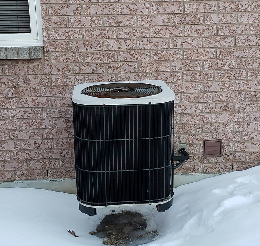 Outdoor AC unit installation — Stacks Heating and Air Oshawa